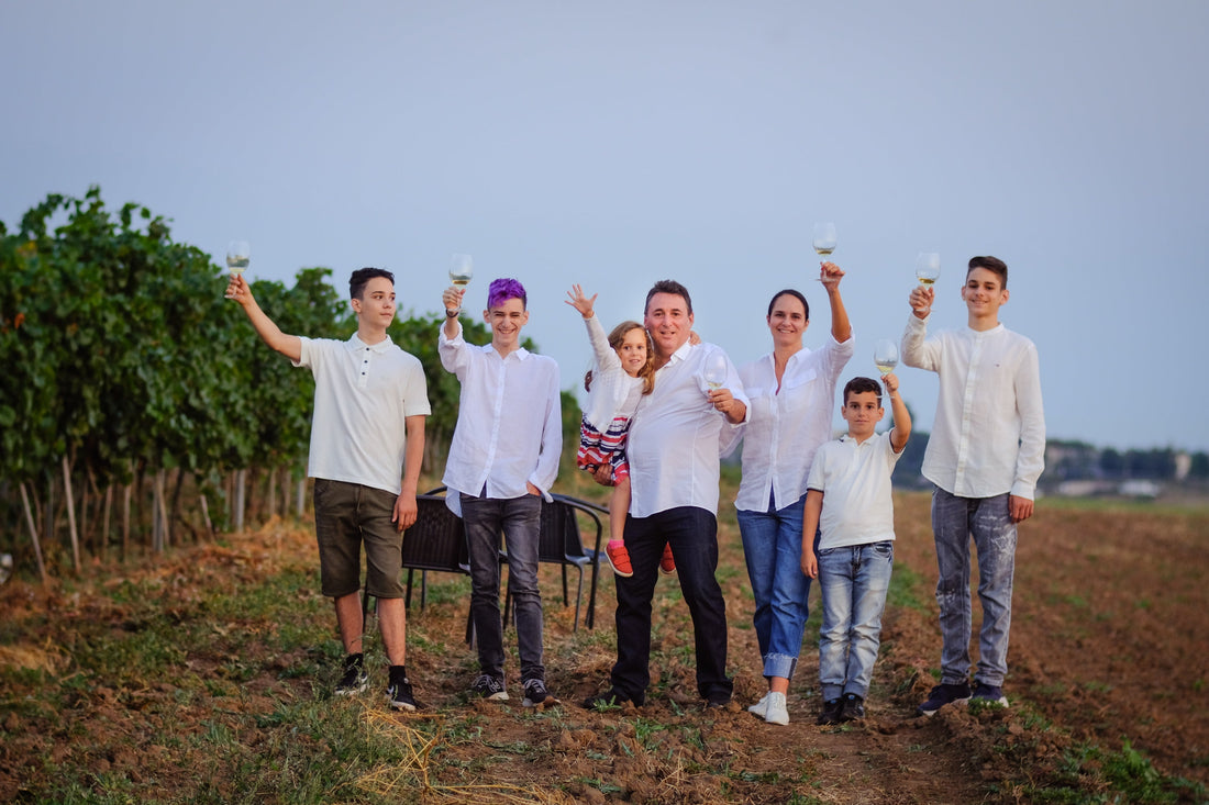 Beykush winery owners family raising glases